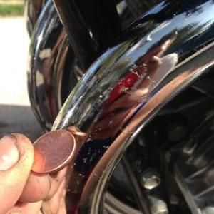 Got stuff melted or stuck on chrome? Use a penny to scrape it off. The copp