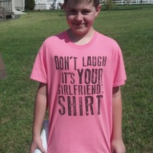 My 13 year old nephew and his new shirt.