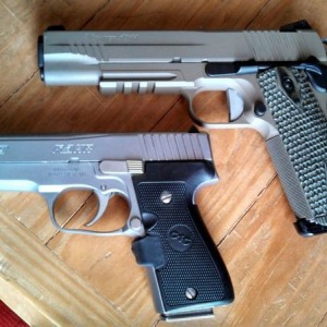 Two new additions to the family. Sig 1911 Scorpion and Kahr K9 with Crimson