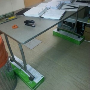 Is your office table too low? Improvise This message was sent from a Bell m
