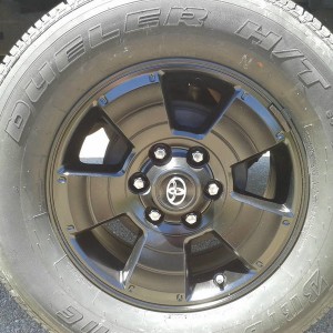 Stock alloy wheel painted black