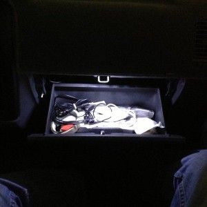Lighted glove box