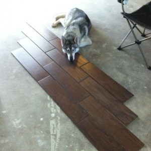 Lied out the tile in two different patterns (1/3 and 1/2 tile). Wife was li