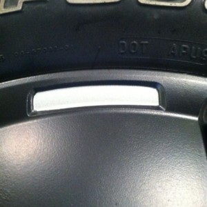 Cut it out of the little part of the spoke.