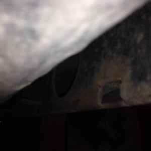 Maybe this one is better. Bottom rear of the front bumper.