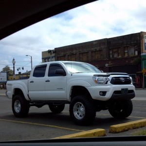 At Les Schwab Tire. Plate says 'rub1off'