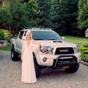 My bride posing with my truck. Didn't even know she did this until we 
