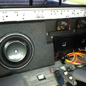 Sub box and amp rack installed