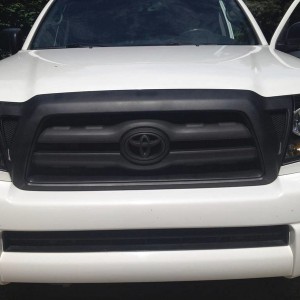 Dipped grill and emblem