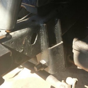March Customs steering linkage bracket