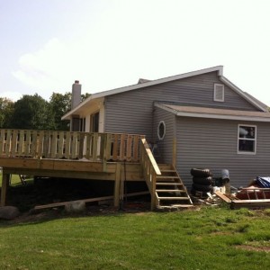 The deck is done! Next up...bamboo floors! Then maybe my garage?