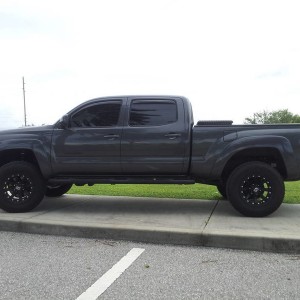2011 double cab long bed 4x4 sport with OME lift.