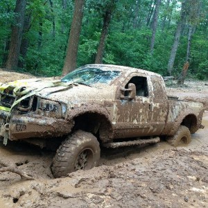 This was stuck. F250, 12" lift, riding on 40" tires Snapped the c