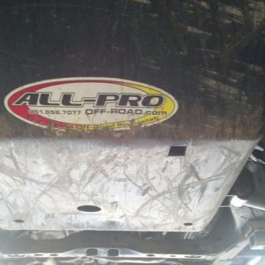 One well used skid plate