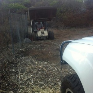 Buddy got his bobcat stuck in a hole. Sounds like a good excuse to play wit