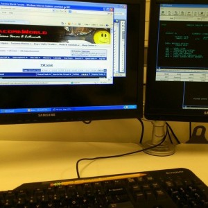Working hard.. (Hunter, the focus of this pic is my monitors with TW open, 