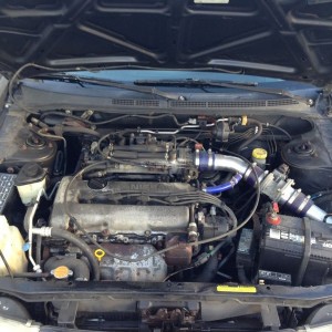Sweet intake, +30hp easy. And yes that's the ever famous sr20 in there