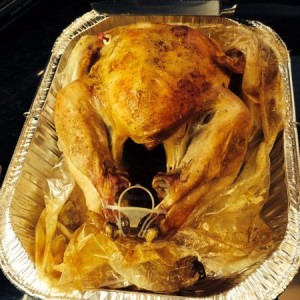 Turkey in a bag w/ celery and onions inside the bird, seasoned with poultry