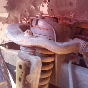 Front strut spacer