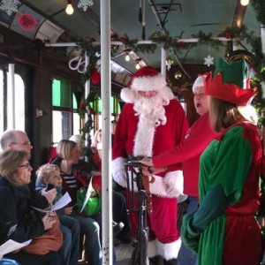 Riding a Santa trolly.