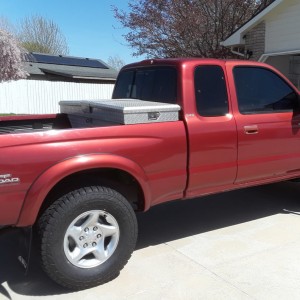 From the rear side, truck box has been on five trucks. I like the wing type truck box, don't have to get in the bed to open it!