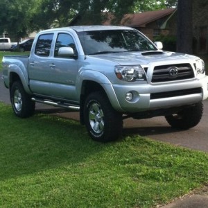 2009 silver tacoma with 3 inch lift