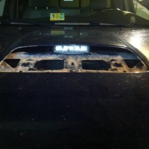Sizing up light in hood scoop