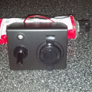 Custom bracket for a switched USB charger, going in bed cubby