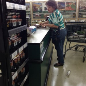 Another old timer balancing her check book holding up the only line OPEN!!