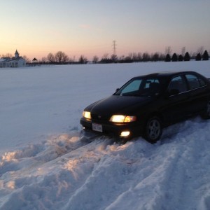 Busting fresh pow in an open diff Sentra on dry rotted all seasons is not a