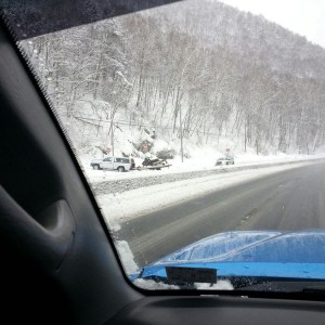 5 lugger stuck trying to get into a parking lot. Jack knifed the trailer an