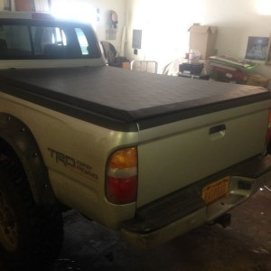 With tailgate cap.