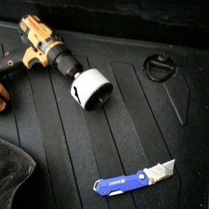 Cut some holes in the bed mat for access to extra D-rings