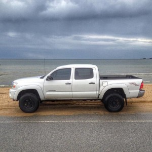 side profile windows tinted and truck lifted