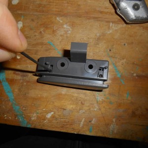 Center console latch fix