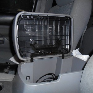 Center console latch fix