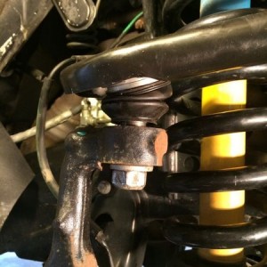 How does the upper control arm ball joint tighten. Trying to help another m