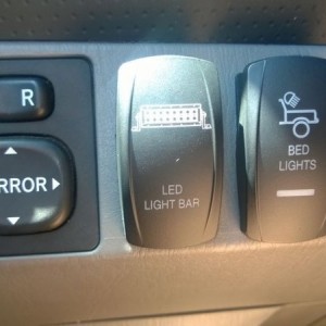 New light bar switch. Thinking of changing the rocker on the bed switch to 