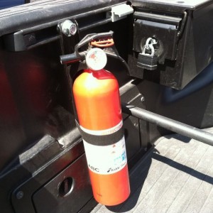 Jury rigged fire extinguisher mount.