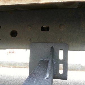 3rd leg from front.  Notice the rivets.