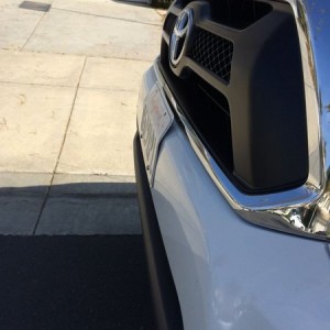 License plate mod. Going to put a 30" light bar in the lower bumper.