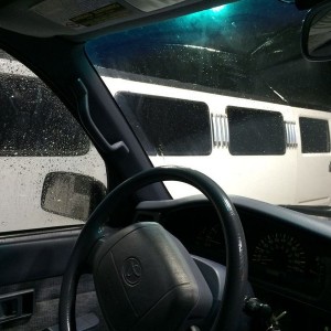 Hiding from the hail again next to a hummer limo lol