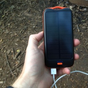 This thing is awesome. 10,000 mah, charges via solar or USB. Two USB ports,
