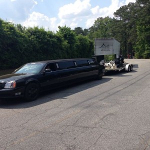 A friend of mine pulled his snowmobile with his limo to a show. Lol