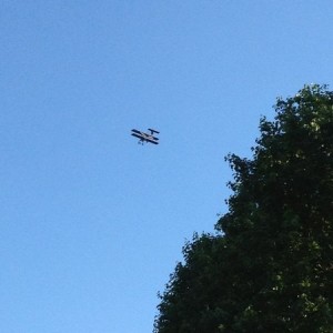 Wright b. flyer replica from the local museum out flying around.
