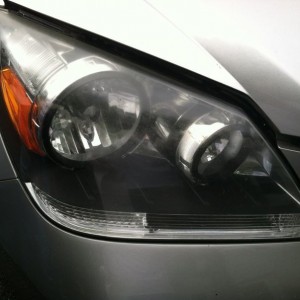 Polishing the old lady's headlights. ;)