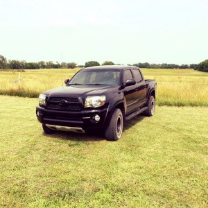 City boy off-roading. Driving through pasture to do some fishing. About as 