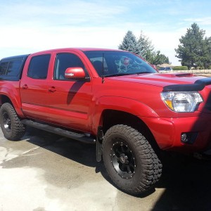 Red Tacoma black canopy