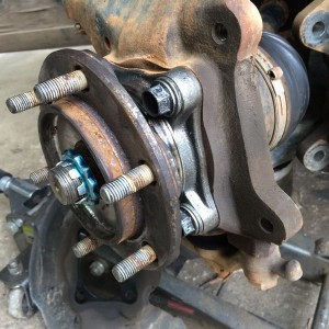 New wheel bearing in but forgot the rotor dust shield....dammit!