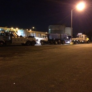Double tow trucks for the 90,000 lb tanker truck